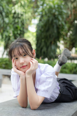 asia thai high school student uniform beautiful girl smile and relaxの写真素材