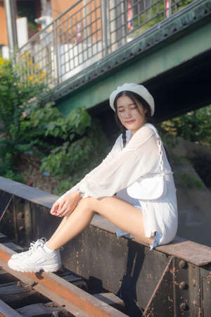 asia thai teen blue dress beautiful girl smile and relax