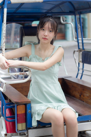 asia thai girl green dress beautiful girl smile and relaxの写真素材