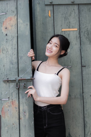 asia thai girl White dress beautiful girl smile and relaxの写真素材