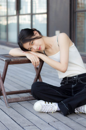 asia thai girl White dress beautiful girl smile and relaxの写真素材