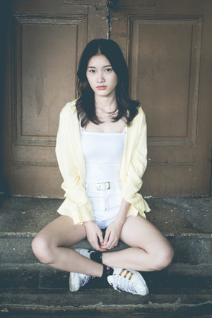 asia thai teen color t-shirt beautiful girl smile and relax, in Vintage Styleの写真素材