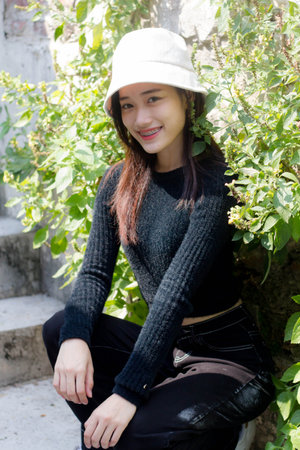 asia thai teen black t-shirt beautiful girl smile and relax