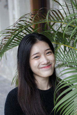 asia thai teen black t-shirt beautiful girl smile and relax