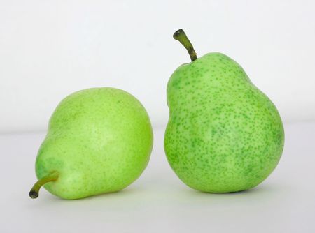 Two green toned pearsの写真素材
