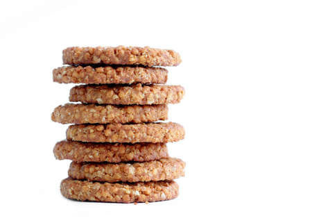 Crunchy wholegrain cookies on white backgroundの写真素材
