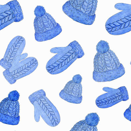 watercolor seamless pattern with mittens and hats, blue knitted winter clothing.Christmas patternの写真素材