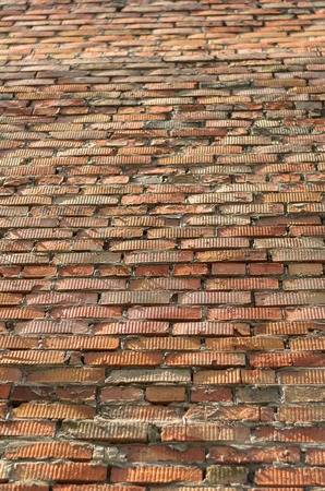 Abstract Old Vintage Cracked Bumpy Rough Brick Wall Texturedの写真素材