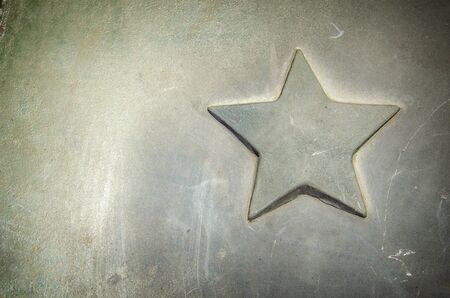 Details of a vintage car close-up. Details of military equipment. Metal star adorning the hood of a vintage armored vehicle. for advertising.の写真素材