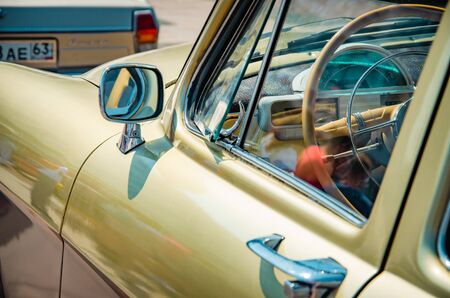 Details of a vintage car close-up. for advertising. The mirror of a collection car of a representative class of the middle of the last centuryのeditorial素材
