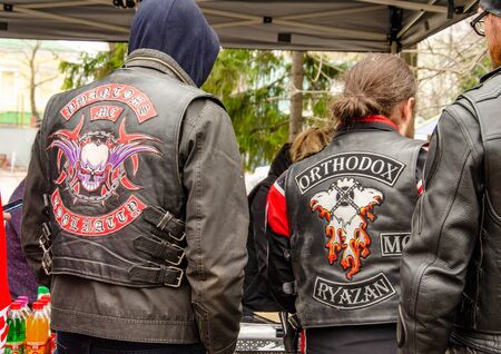 Ulyanovsk, Russia - May 03 2019: bikers in black club jackets of various clubs communicate at the...