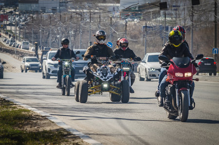 Ulyanovsk, Russia - April 23, 2022: Quad bike and motorcycles at the opening of the biker seasonのeditorial素材