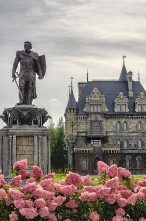 2022-09-13, Russia, Samara region: Beautiful Garibaldi Castle with a flower garden. Blooming hydrangeas in the foreground.のeditorial素材