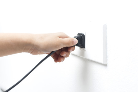 children hand unplug correctlyの写真素材