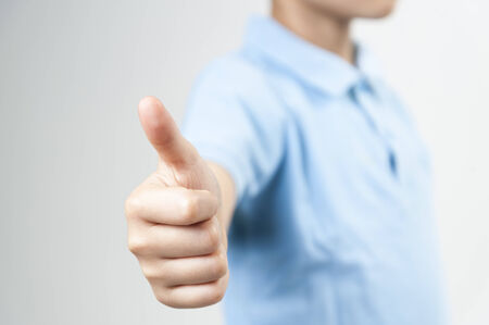 A boy showing he like to youの写真素材