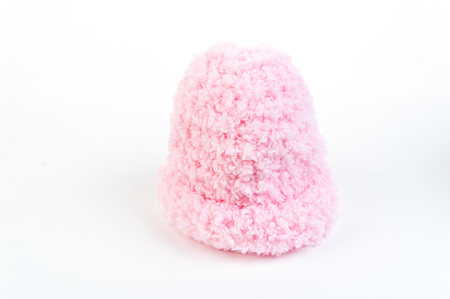 Pink newborn knitting wool on isolate white backgroundの写真素材