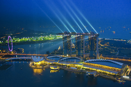 SINGAPORE, SINGAPORE - September 26, 2012: Marina Bay Sands Resort at night in light show. It is big casino in this hotel. Shooting with high ISOのeditorial素材