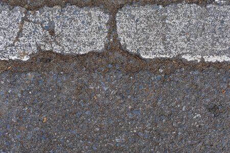 Close up a crack line on the roadの写真素材