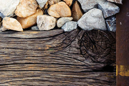 Old wood and stone that support railwayの写真素材