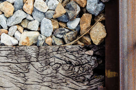 Old wood and stone that support railwayの写真素材