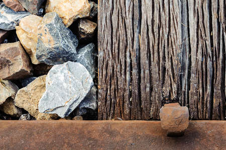 Old wood and stone that support railwayの写真素材