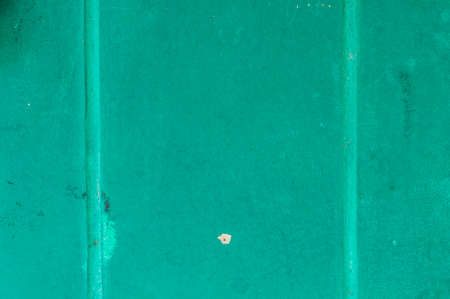 Green color old stripe concrete wall background textureの写真素材
