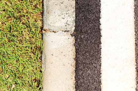 The black asphalt road background texture with white line
