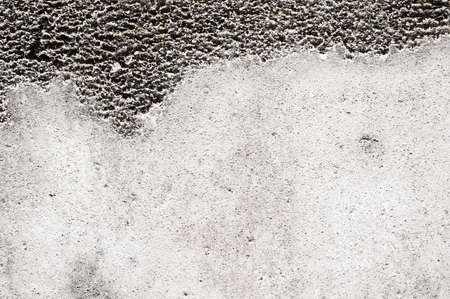 Old grunge concrete wall cover by Lichenの写真素材