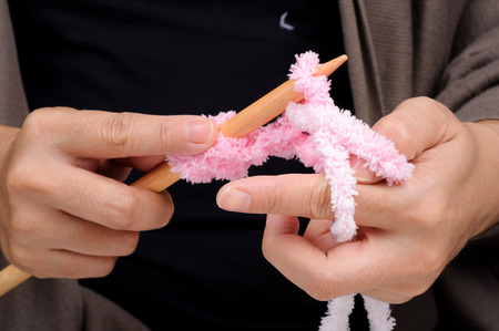 Woman hand use wood knit for wool hand workの写真素材