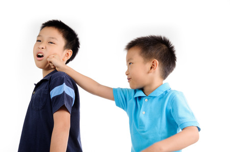 Boys are brother punch and fighting on white background