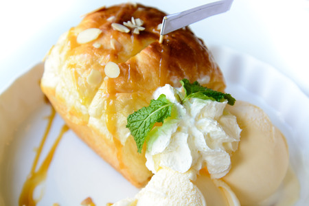 Honey Toast and bread topped with ice cream top with mint leaf