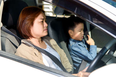 Asian woman prepare seat belt before start driving in carの写真素材