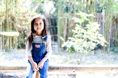 Portrait of young Thai girl in the gardenの写真素材