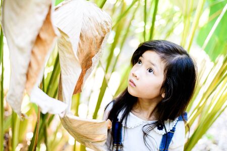 Portrait of young Thai girl in the gardenの写真素材