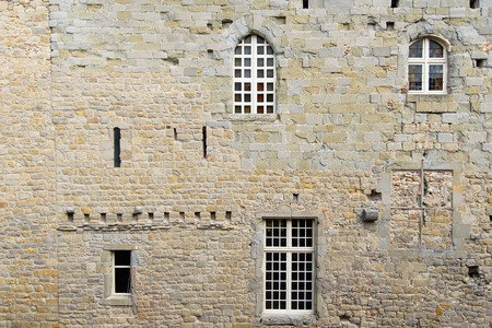 Antique of more than century aged of stone wall and window slot from the ancient city.の写真素材