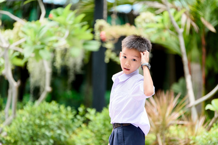 Young Thai student boy in school uniform.の写真素材
