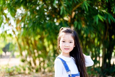 Portrait of young Thai girl in the gardenの写真素材