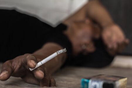man smoking a cigarette. Cigarette smoke spread., ignore cigarettes.Stop Smoking Concept. 