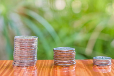 Close up of coins to stack of coins,  Business Growth concept, There is money coins to stack of coins.の写真素材