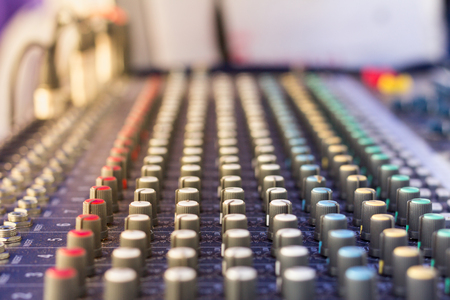 Sound mixing console or Sound mixer controller,blurry backgroundの写真素材