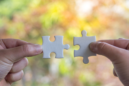 Human Hand Holding Jigsaw Puzzle Business Connection, Business Conceptsの写真素材
