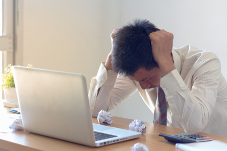  businessmen feeling stress from work in the office.
の写真素材