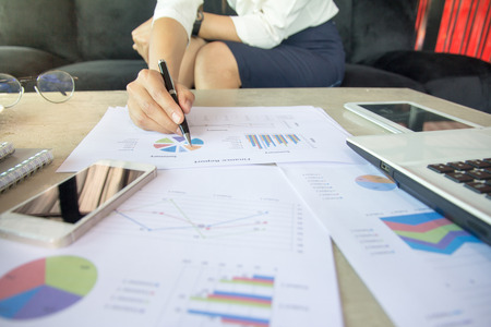 Businessman pen pointing graph chart for analyzing investment,Business analysis and strategy concept,の写真素材