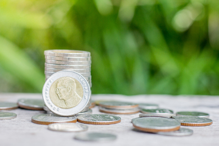 Coin on the wooden table, Money, Financial, Business Growth concept,Saving money for retirement planning.の写真素材