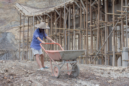 Children work construction because of poverty. Violence children and trafficking concept,Anti-child labor, Rights Day on December 10.の写真素材