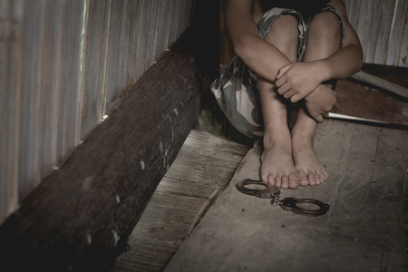 Stop violence against children and anti-trafficking concept, violence, terrified , A fearful child. Stop abusing violence, terrified,の写真素材