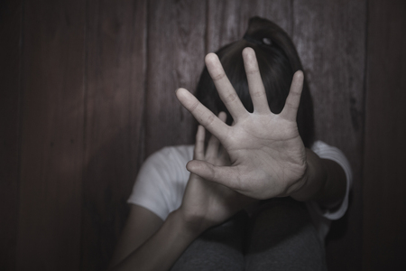 Women  bondage lift hands against violence against women,  image blur,international women's dayの写真素材