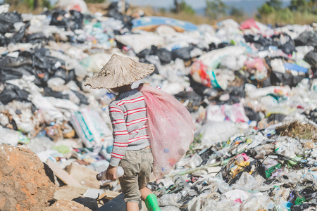 Children are junk to keep going to sell because of poverty, World Environment Day, Child labor,  human trafficking, Poverty conceptの写真素材