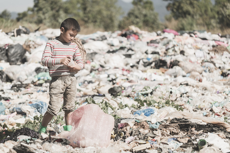 Children are junk to keep going to sell because of poverty, ,World Environment Day, Poverty conceptの写真素材