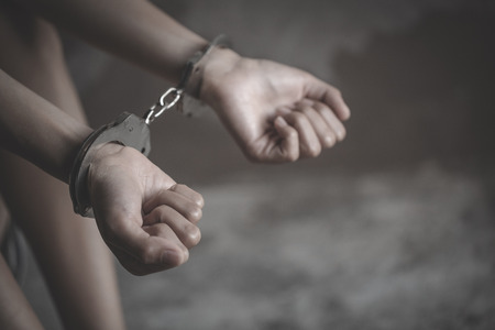 The slave girl was handcuffed and kept . Women violence and abused concept, Human rights Day concept. human trafficking Concept, international women's day.の写真素材
